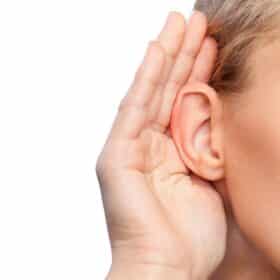 picture of hand cupped around an ear